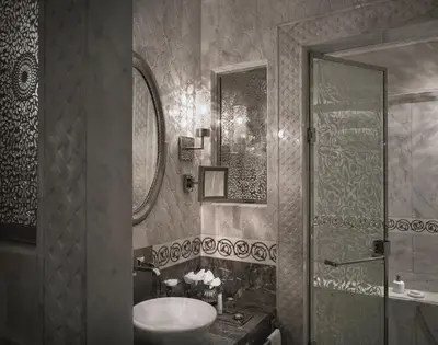 a black and white bathroom with a sink and a shower at Royal Mansour Marrakech in Marrakech