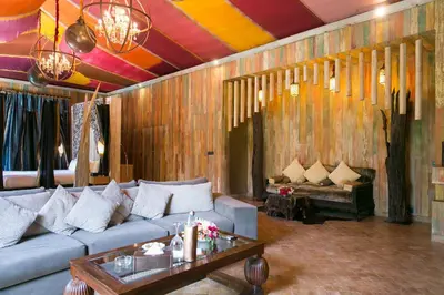 a living room with a couch and a table at Lodge K in Marrakech