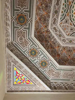 a ceiling of a building with patterns on it at Riad Deluxe in Marrakech