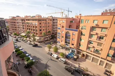 an aerial view of a city with buildings and cars at A stunning 2 bedroom Hivernage in Marrakech