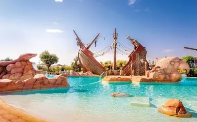 a water slide in a water park at Vizir Center Appartements in Dar Caïd Layadi