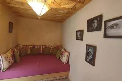 a bedroom with a purple bed in a room at RIAD PRIVATISÉ 3 Chambres 6 Personnes Place Jemma El Fna in Marrakech