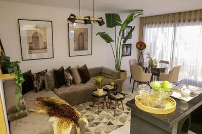 a living room with a dog laying on the floor at S_house in Marrakech