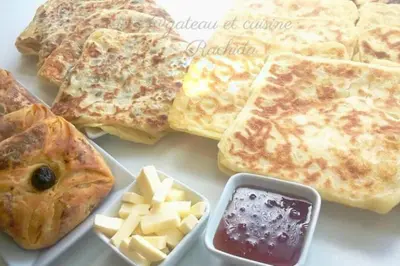 a plate of food with pancakes and other foods at Rita House - Le Petit Paradis sur Terre in Douar Caïd Layadi
