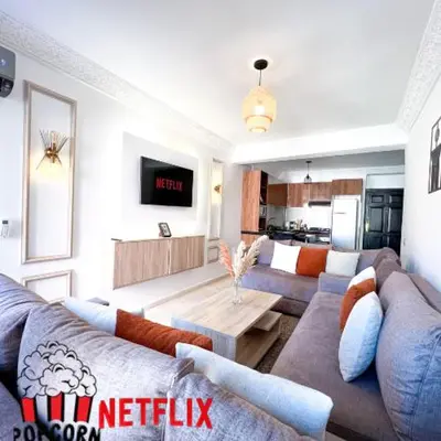 a living room with two couches and a table at Apartment for Rent Luxury Stay Near to Jemaa el-Fnaa in Marrakech