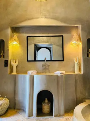 a bathroom with a sink and a mirror at Riad Casa nomad in Marrakech