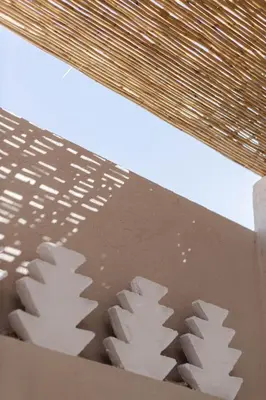 a close up of a book with leaves on it at Riad M17 & Spa - Médina in Marrakech