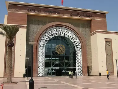 a large building with a clock on the front of it at Nour 5 marrakech in Marrakech
