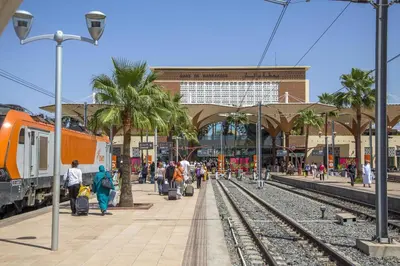 people waiting for a train at a train station at Nour 5 marrakech in Marrakech