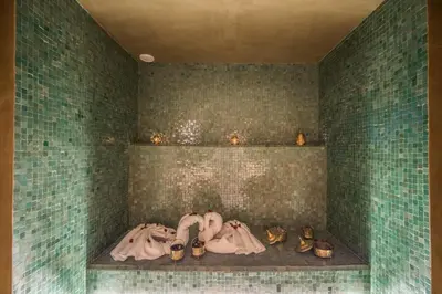 a room with several pairs of shoes on a shelf at JEMAA EL FNA Suites & Spa in Marrakech