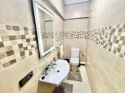 a bathroom with a sink and a toilet at Cozy&Elegant apartment/pool/city center/Gueliz in Marrakech