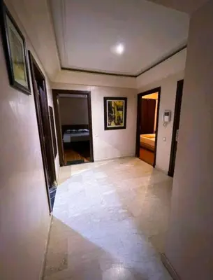 a hallway of a house with a tile floor at Gueliz budget Stay in Marrakech
