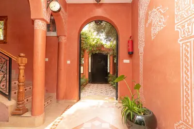 an entrance to a building with an archway at Villa Korima in Marrakech