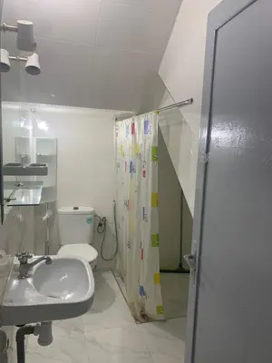 a bathroom with a sink and a toilet and a shower at Marrakech in Marrakech