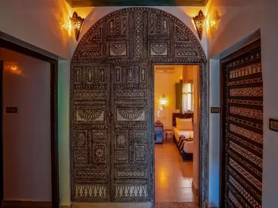 an entry door to a room with a bedroom at Riad Dar Sido in Marrakech