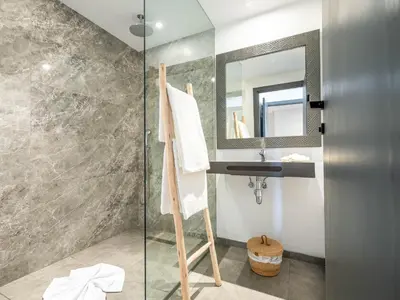 a bathroom with a sink and a mirror at Fashion Boutique Hotel in Marrakech