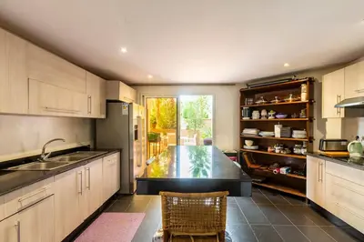 a kitchen with a sink and a counter top at Somptueux Duplex au coeur de l'Hivernage in Marrakech