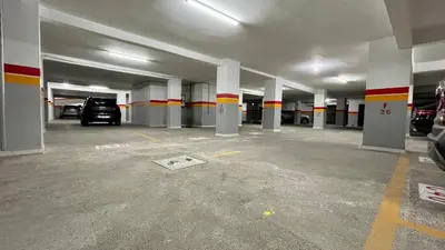 a parking garage with a car parked in it at Perle en plein Gueliz in Marrakech