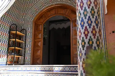 an entrance to a building with a wooden door at Marrakech art in Marrakech