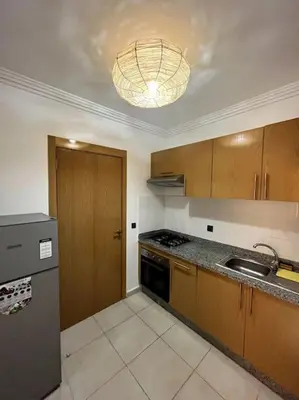 a kitchen with a sink and a stove at NS 36 by Majestic Properties in Marrakech