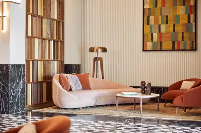 a living room with a couch and a table at Park Hyatt Marrakech in Marrakech