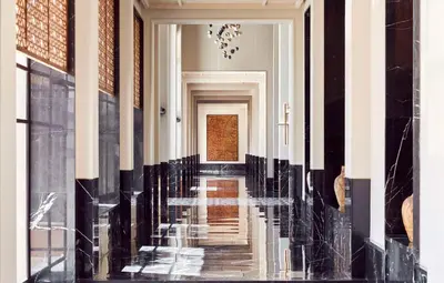 a hallway of a building with black and white stripes at Park Hyatt Marrakech in Marrakech