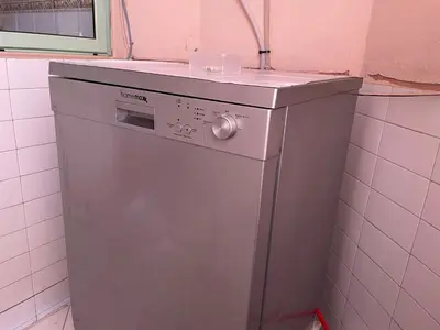 a washing machine in a bathroom with a counter at ☆HIVERNAGE☆ Charming , Spacious & Bright with Pool in Marrakech