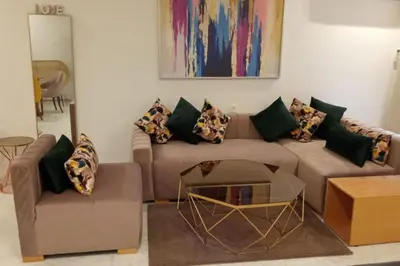 a living room with a couch and a coffee table at 1Bed Apartment - Sleeps 4 - Balcony Wifi Parking in Marrakech