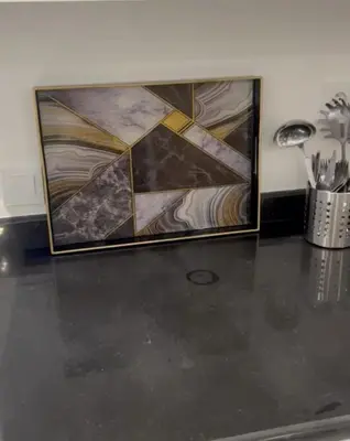 a painting sitting on top of a table at 1Bed Apartment - Sleeps 4 - Balcony Parking Wifi in Marrakech