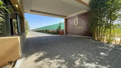 a walkway outside of a building with a window at Duplex IKA - Appartement design à Marrakech in Marrakech