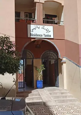 a building with a sign that reads resistance variates at Appartement Marrakech Gueliz 5 Min Drive to City Center in Marrakech