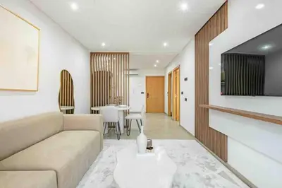 a living room with a couch and a table at New ! Logement Chic, Emplacement Idéal in Marrakech