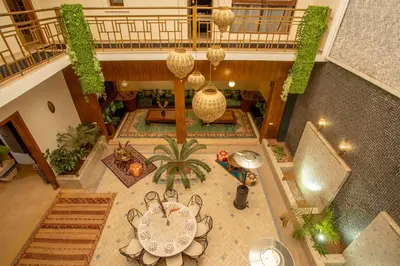 an overhead view of a lobby with a table and chairs at Riad Azia in Marrakech
