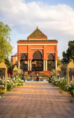a building with a pathway in front of it at Nomadz Palace in Marrakech