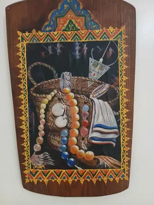 a picture of a painting with beads on it at Paradise house in Marrakech