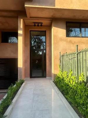 a entrance to a building with a glass door at Rooftop Pool, Atlas View, M avenue in Marrakech