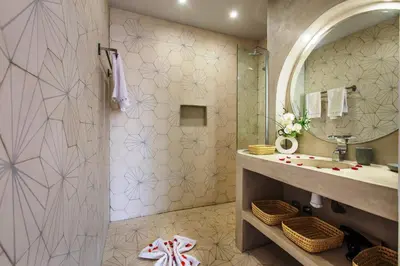 a bathroom with a sink and a shower at Villa Serenity & SPA - Breakfast in Marrakech