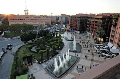 an aerial view of a city with a fountain at Lala's apartment in Marrakech