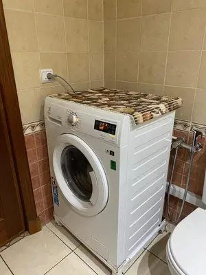 a washing machine with a counter on top of it at Lala's apartment in Marrakech