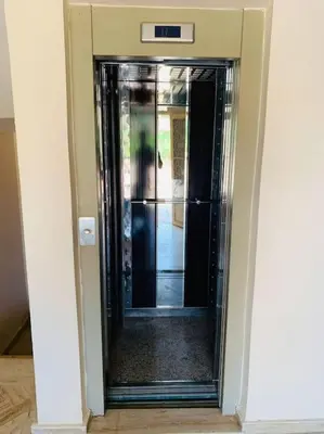 a door to a room with a glass door at Luxury, Cosy Apartement (Wifi, Balcony, Parking) in Marrakech