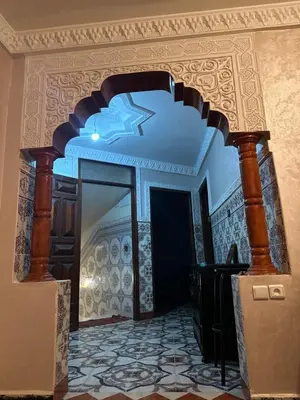 a room with a large mirror and a ceiling at Stylish Moroccan Apartment Near Marrakech Airport in Marrakech
