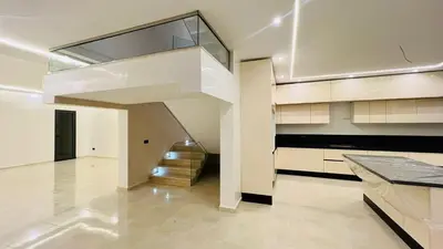 a large kitchen with a staircase in a house at LUXURY Villa Argane 5 BDR -ONLY FAMILYS in Marrakech
