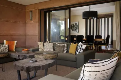 a living room with a couch and a table at Villa MISH-MISH in Marrakech