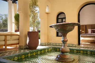 a large vase sitting in the middle of a room at Dar Banati Palmeraie in Marrakech