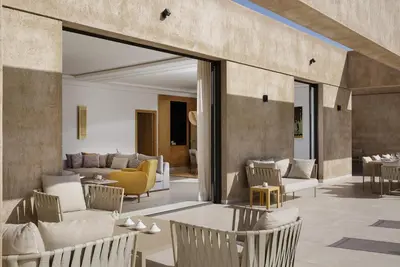 a living room with couches and chairs at Villa PEPE in Marrakech