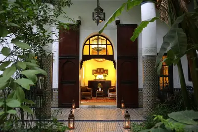 an entrance to a house with a living room at Palais Riad Lamrani in Marrakech