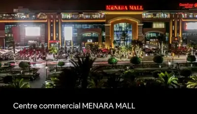 a view of a shopping mall at night at Appartement gueliz 30 in Marrakech
