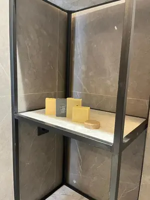 a shelf with three blocks of soap on it at Appartement 2 ch in Marrakech