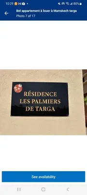 a sign that reads resistance less palmers of taza at Les Palmier de targa, Romantic appartement in Marrakech