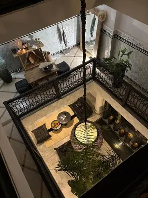 an overhead view of a living room with a table at Riad Dar Belhaj in Marrakech